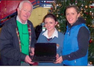 Winner of a laptop at the sports pitch draw 2012