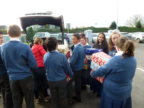 Packing the transport of the shoeboxes collected for Team Hope