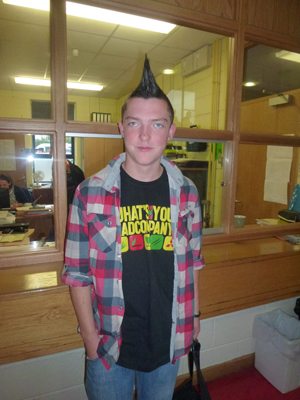 Student taking part in the Mad Hair Day for Charity in Desmond College