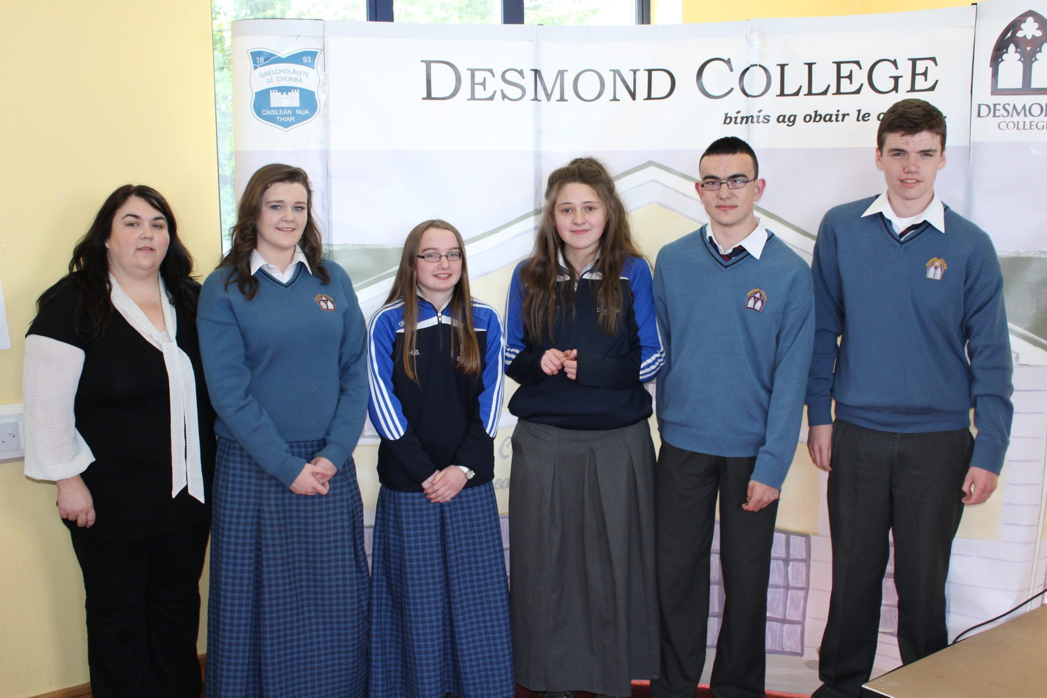 Third Year Attendance Awards: Desmond College: Miss Supple with Niamh O'Connell, Hannah Barrett, Muireann Tobin, Liam Conway and Mark Cahill