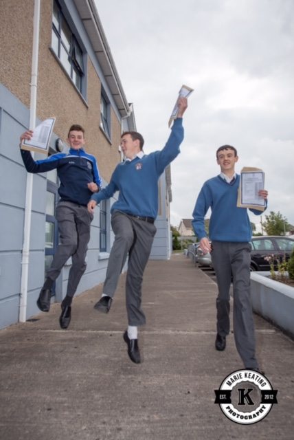 Kealan O Connor, Denis Cronin and Gary Byrnes jump for joy after receiving their results