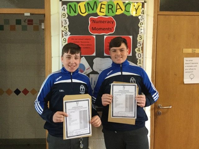Tomas McCarthy and Ronan St John display their fantastic Junior Cert Results