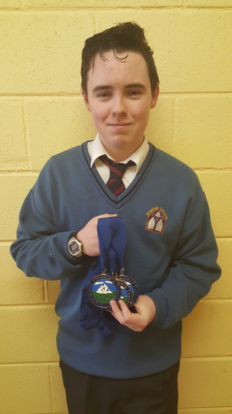James Shepherd Second Year student at Desmond College proudly displaying three medals that he won at South Kerry Taekwondo tournament.