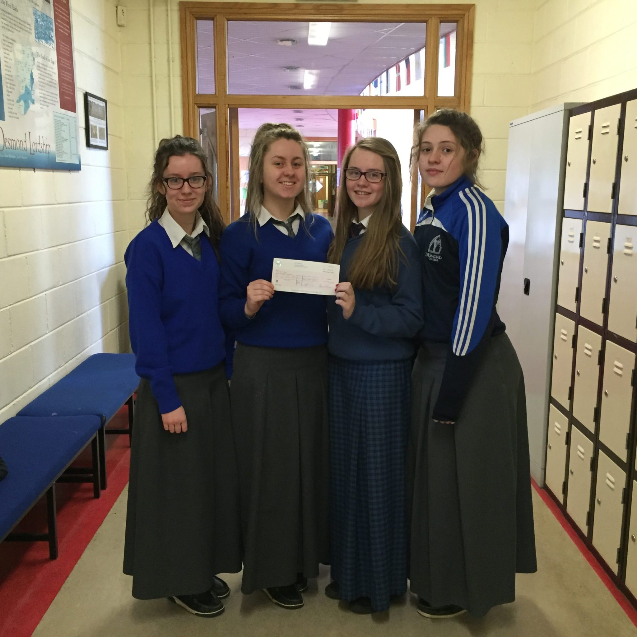 Feb 2016: Desmond College TY students who received a cheque from Tesco for their Hope Foundation immersion programme