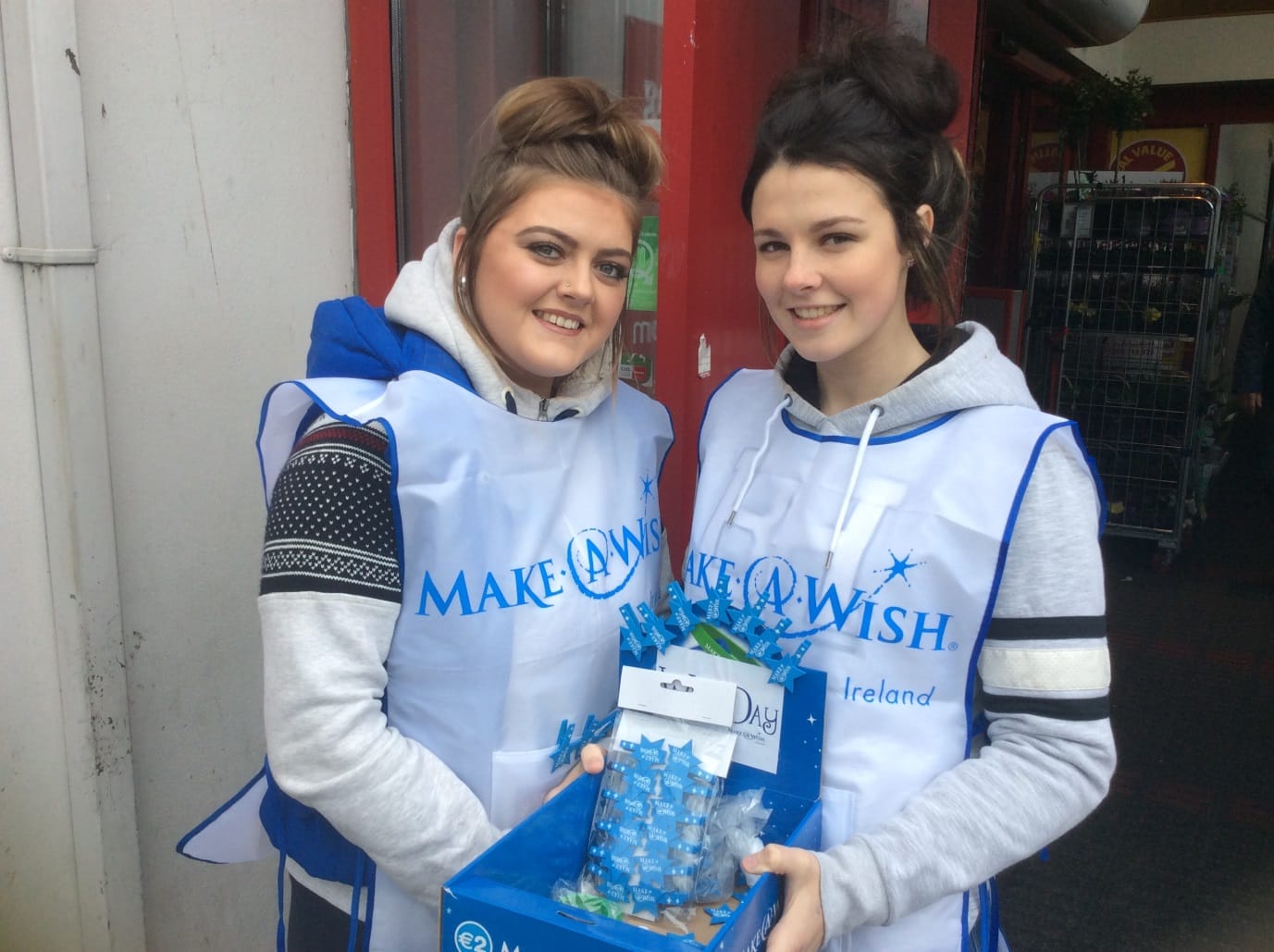 2016 April: Desmond College students Nikita Harnett and Leah Kelly, collecting in Newcastle West Town Center for Make a Wish Foundation