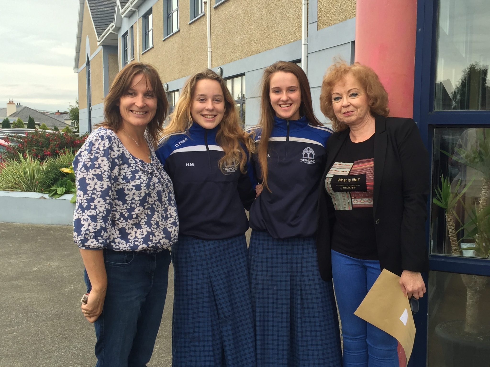 Sept 2016: Hannah McMahon and Roz Barrett pictured with both their mums after receiving their Junior Certificate Results outside Desmond College Post Primary School Limerick
