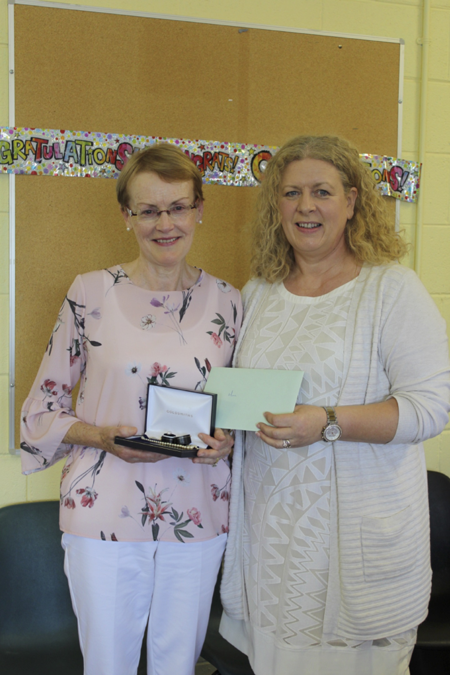 June 2017: Ms Vourneen Gavin Barry presenting Mona with a gift on behalf of all the staff