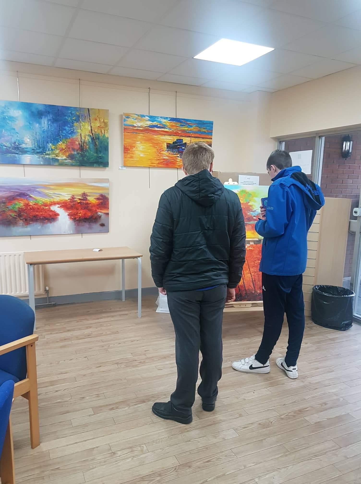 AJ Dee and Alan Wallace admiring the Art Exhibition in the local Library