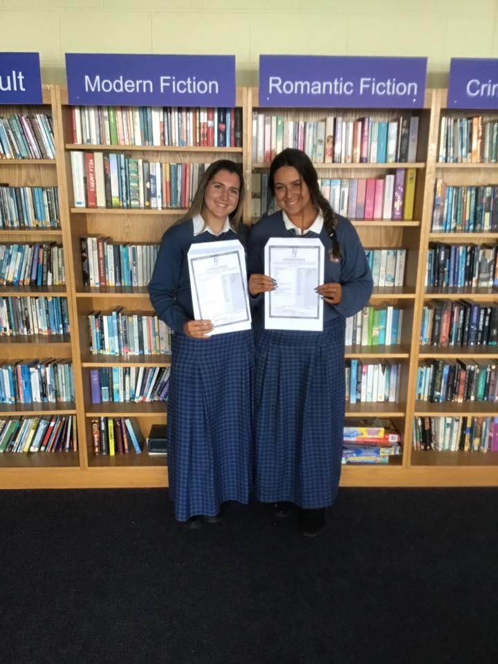 Desmond College students in School Library pleased with their results